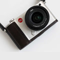 Ergonomic wooden handgrip (wavy design) made of dark ebony for Leica T, TL, TL2 camera.