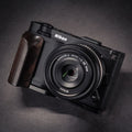 Nikon camera on a dark gray background