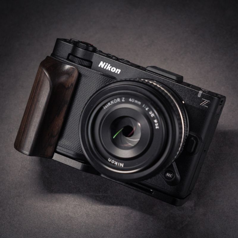 Nikon camera on a dark gray background