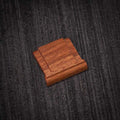Ricoh GR4 Hotshoe Cover Wood iWoodStore Wooden square object on a textured dark surface